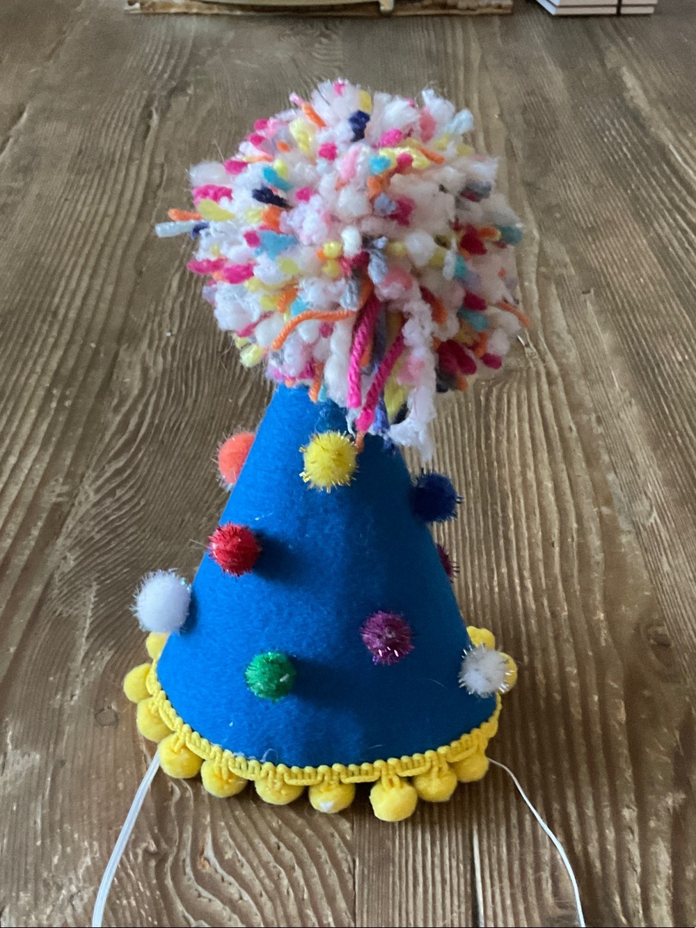 Bright Blue Kids Pom-Pom birthday Party Hat with Multicolor Accents